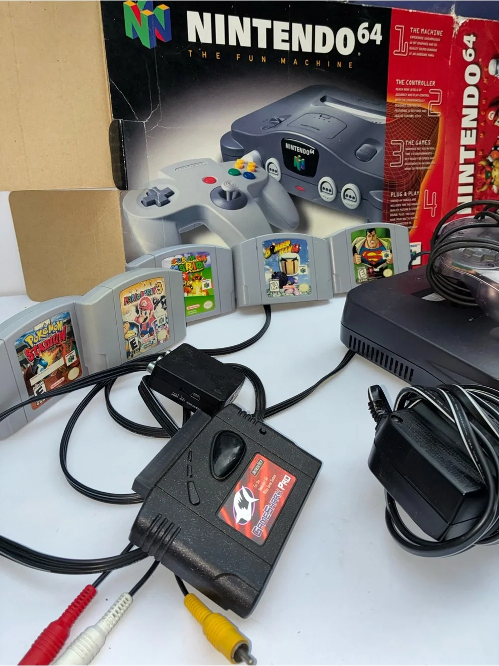 Nintendo 64 Console with Translucent Clear Controllers and Gray Console